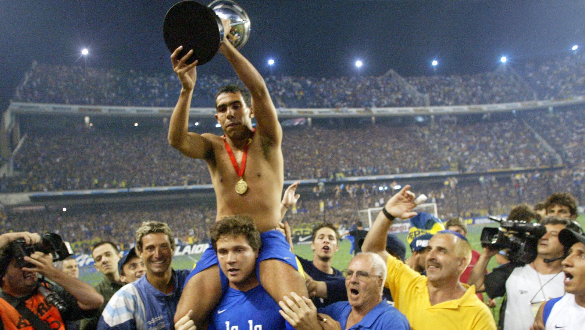 Carlos Tevez of Boca Juniors displays th