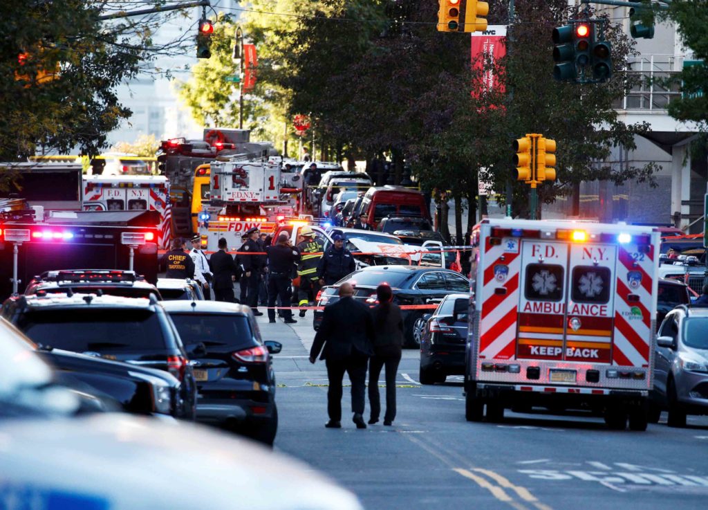 A Home Depot truck is seen as New York city first responders are at the crime scene near a bike path in lower Manhattan in New York